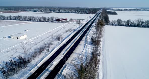 Aerial View of the Snow Road in Winter