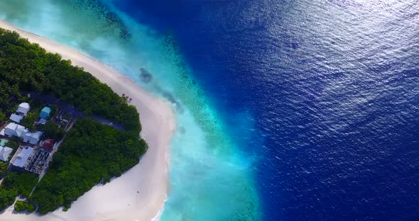 Daytime above clean view of a sunshine white sandy paradise beach and blue ocean background in best 