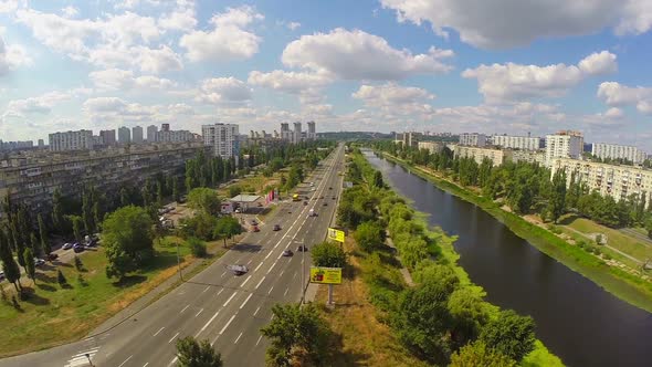 Aerial Shot City Road and River in Green Residential Area