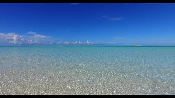 Aerial view texture of relaxing seashore beach trip by blue ocean with white sandy background of a d