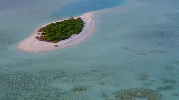 Aerial scenery of shore beach break by blue ocean and sand background