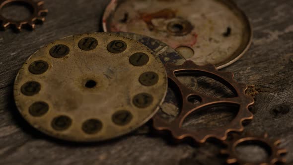 Rotating stock footage shot of antique and weathered watch faces - WATCH FACES 092