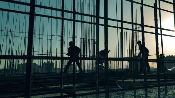 Construction Industry, Construction Project, Building Process During Sunset, Workers Are