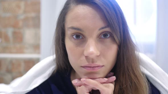 Hispanic Woman Face Lying in Bed