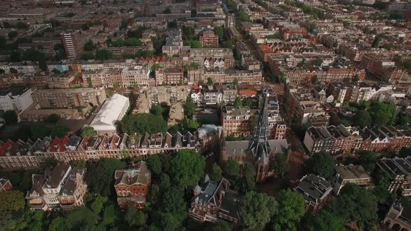 Aerial Shot of Amsterdam with Houses and Volden Church