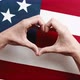 Hand in Heart Shape on American Flag - VideoHive Item for Sale