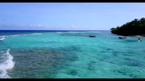 Aerial top down nature of perfect coastline beach holiday by blue ocean and white sand background of