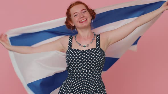 Happy Young Woman in Dress Waving and Wrapping in Israel National Flag Celebrating Independence Day