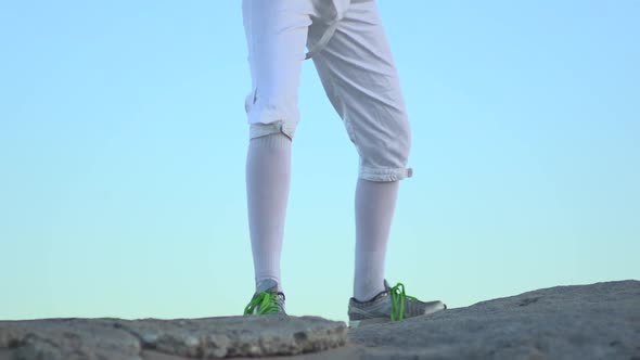 A woman fencing on the beach