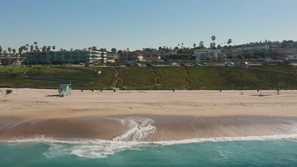 Afternoon drone view with horizontal movement from the coast of Redondo Beach, California. ( DJi Spa