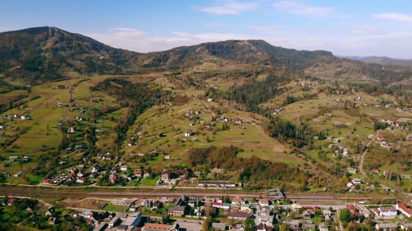 Aerial View on Village Surrounded Mountain