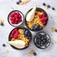 Golden Cornflakes with Fresh Fruits of Raspberries Blueberries and Pear in Ceramic Bowl - VideoHive Item for Sale