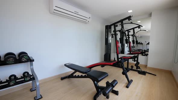 Compact Home Gym With Exercise Equipment and Machine