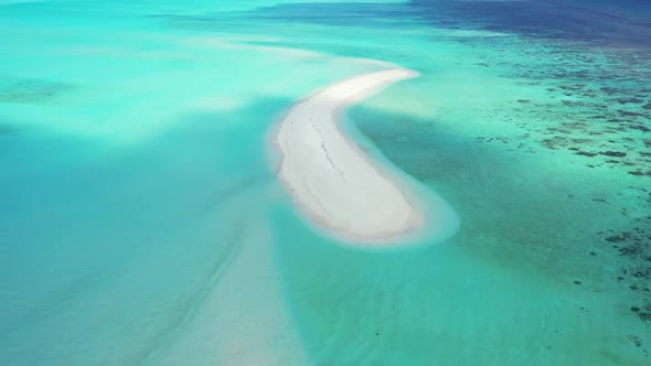 Aerial top view landscape of marine seashore beach trip by turquoise lagoon with white sand backgrou