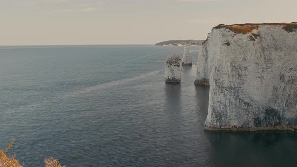 Static shot of the white cliffs and rugged coastline of Jurassic Coast near Dorset, UK