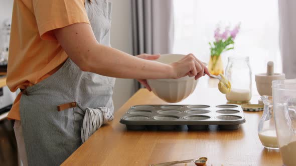 Woman Cooking Food and Baking on Kitchen at Home