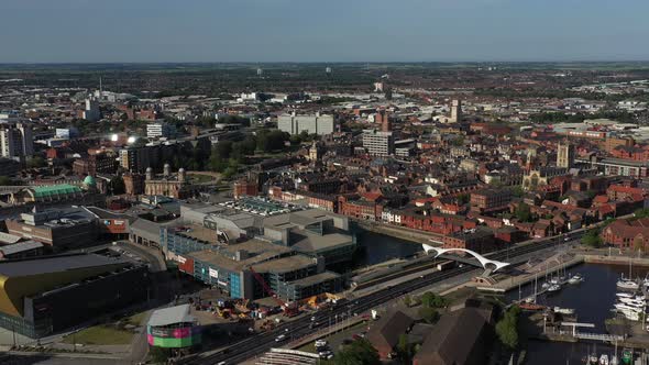 Fast aerial pan over Hull City centre form right to left.