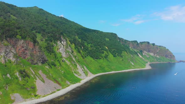 Shiretoko peninsula coastal view with fishing boats