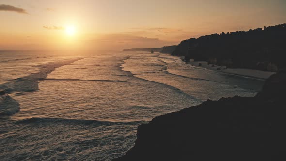 Sunset at Ocean Bay Waves Slow Motion Aerial View