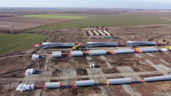 Huge Parts of the Wind Turbines on the Ground Near the Construction Site, 