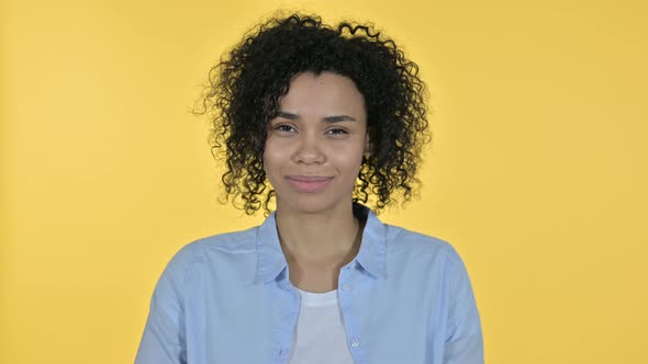 Portrait of Playful Casual African Woman Doing Wink