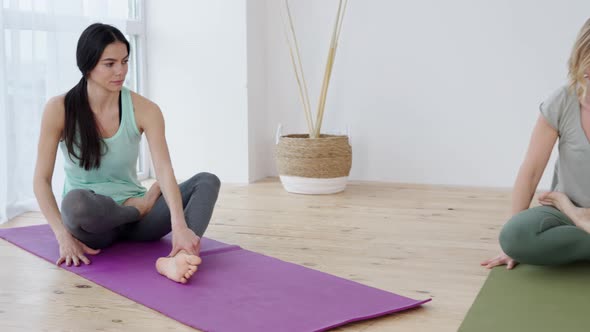 Young Woman Switching to Online Yoga Instructor