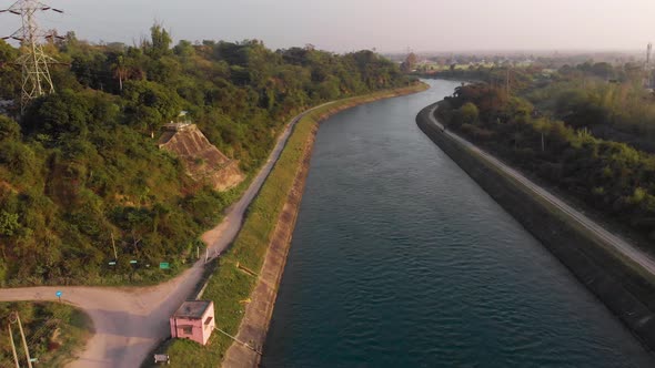 View of crystal clear water of Satluj River is flowing in the middle of the greenery of the Punjab a