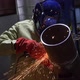 Industrial Worker Using Angle Grinder And Cutting Sparks Slow Motion - VideoHive Item for Sale