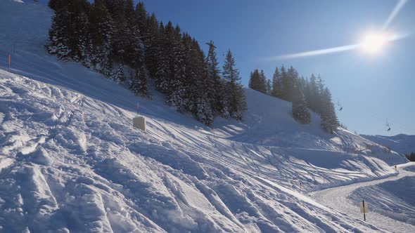 ski area in the Swiss alps with people and chairlifts in the winter ski area of ​​Beckenried