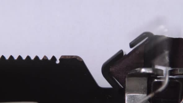 Businessman Writes the Word Start Up on the Sheet of a Typewriter. Close Up