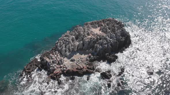 Giant ocean waves crashing on rocks