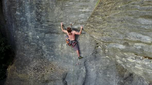 Shirtless climber