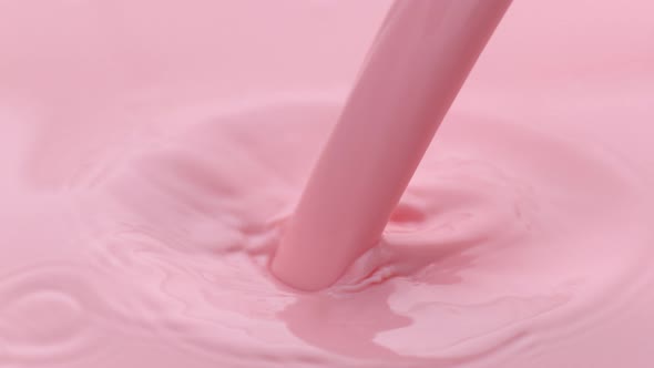 Strawberry milk pouring and splashing in slow motion; shot on Phantom Flex 4K at 1000 fps alt