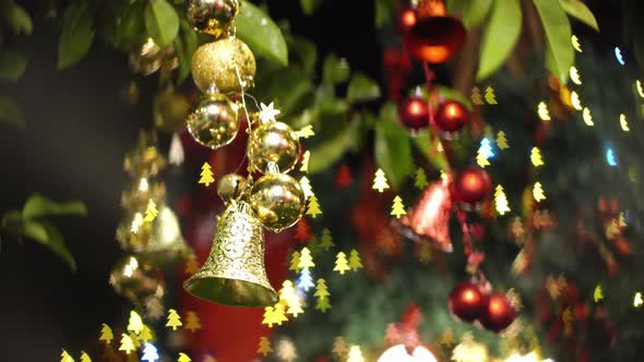 Bell and ball at christmas decoration at tree.