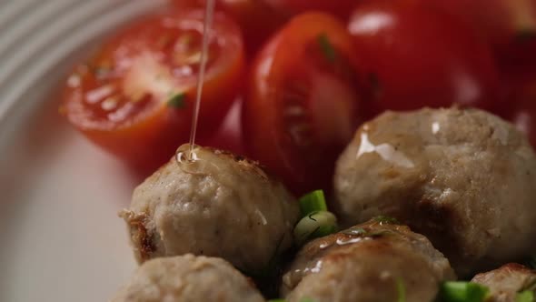 Meatballs with Tomatoes Drizzled with Oil