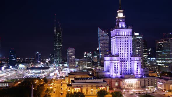 Warsaw skyscrapers at night - time-lapse shot of the city center, Poland, Europe