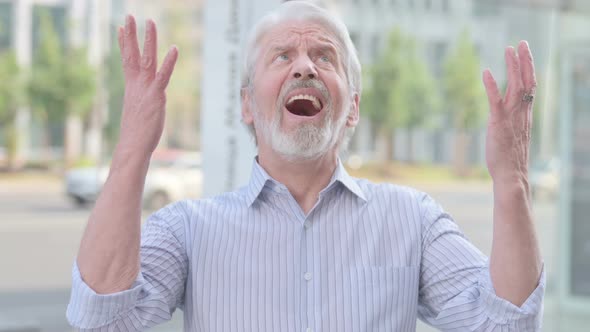 Portrait of Angry Old Man Screaming Outdoor