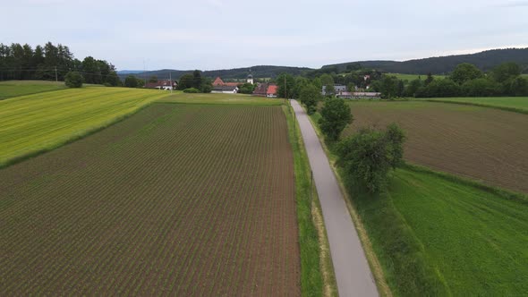 Rural Agricultural Landscape For Farming, Fields end Forest - Aerial Drone Footage