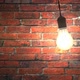 Incandescent Lamp Swinging in Dark Brickwall Room, Seamless Loop - VideoHive Item for Sale