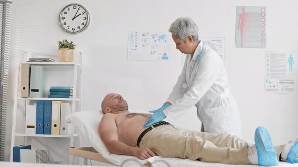 Doctor Examining Patient