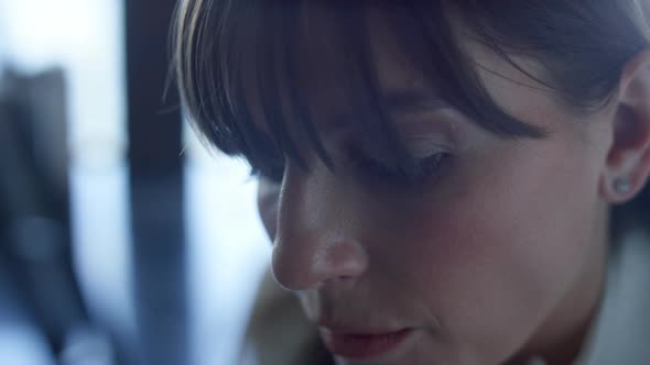 Serious Businesswoman Talking in Office Closeup