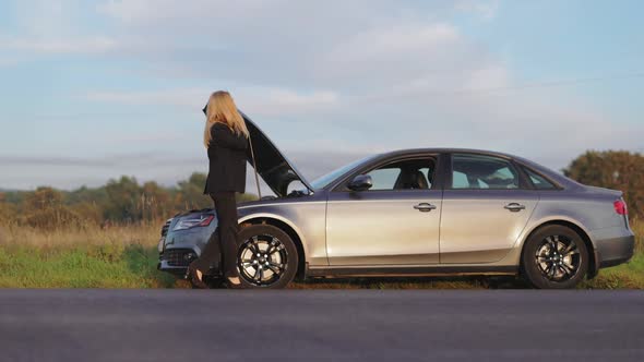 Woman Having Problem with Car