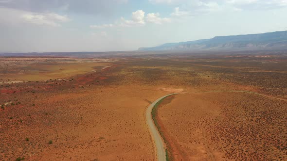 Desert Dirt Road In The Middle Of Nowhere In Utah. - Aerial Drone Shot