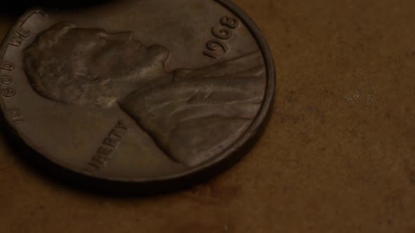 Rotating stock footage shot of American pennies (coin - $0.01) - MONEY 0179