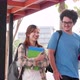Education and student concept. Happy Students walking and talking in college - VideoHive Item for Sale