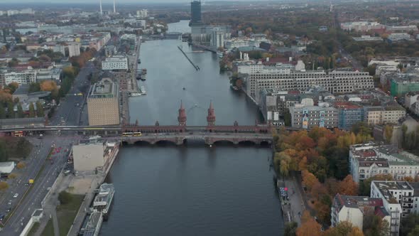 Oberbaum Bridge on Spree River in Berlin, Germany at Daytime, Aerial Dolly Truck Slide Right