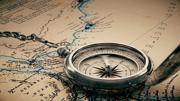 Detailed Old Compass On A Vintage Map