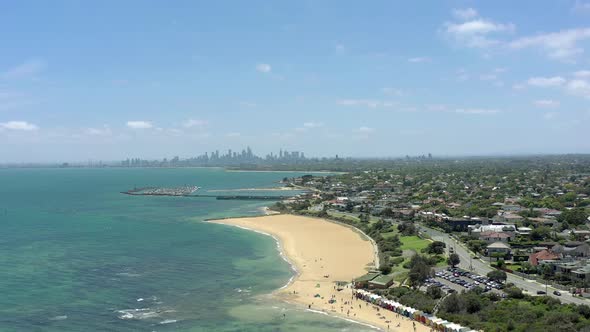 Dendy Street Beach in Melbourne Seen From the Air with the Melbourne Skyline