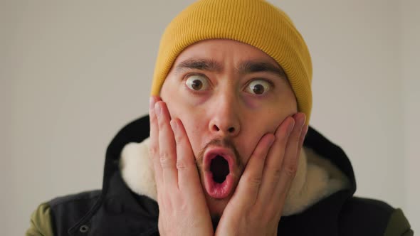 Beard Man Wonder Wearing Winter Clothes Standing Over White Background