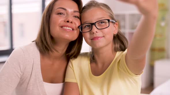 Happy Family Taking Selfie By Smartphone at Home 22